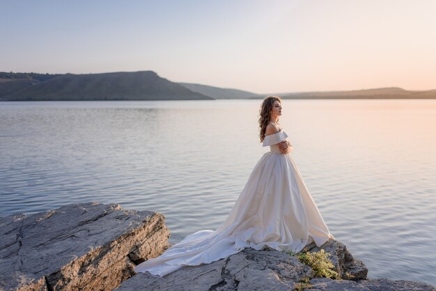 beautiful girl wearing off shoulder wedding dress