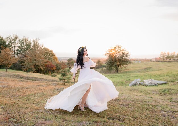 Beautiful bride in dancing evening look