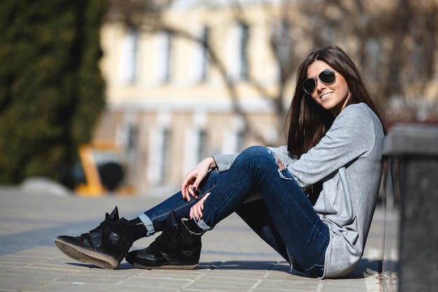 young woman posing city in black boots