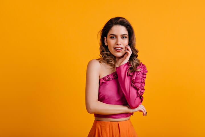 beautiful girl posing in pink top