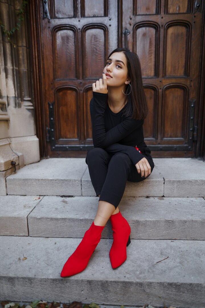 stylish girl in red boots