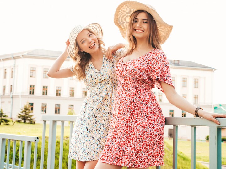 two beautiful girl in summer dresses with sleeves