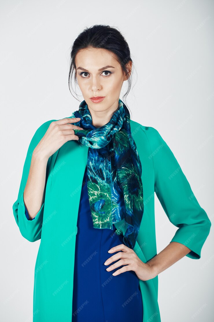 pretty woman posing wearing silk scarf