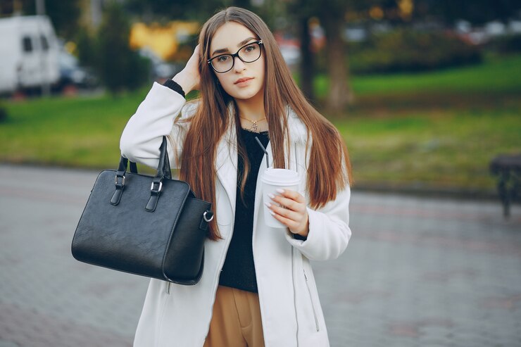 pretty woman posing on street