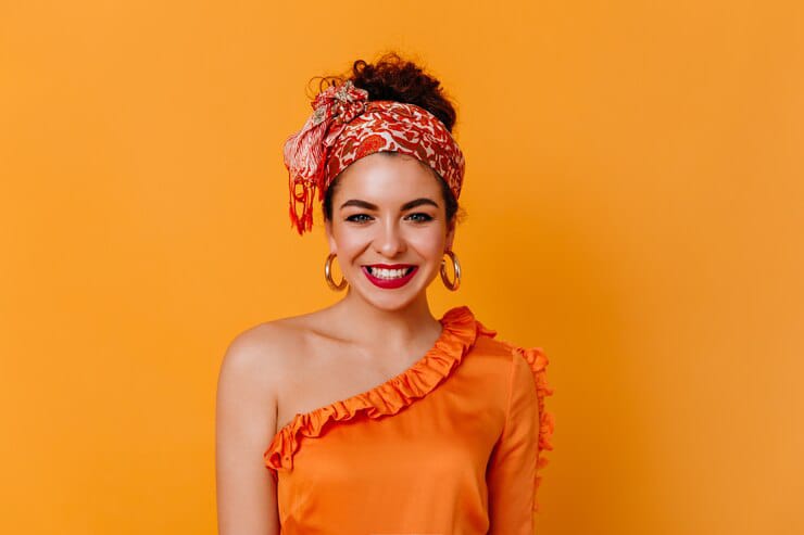 young girl smile wearing hair scarf image