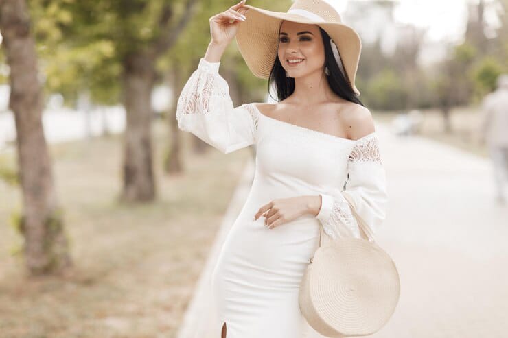 young pretty woman in beautiful white dress