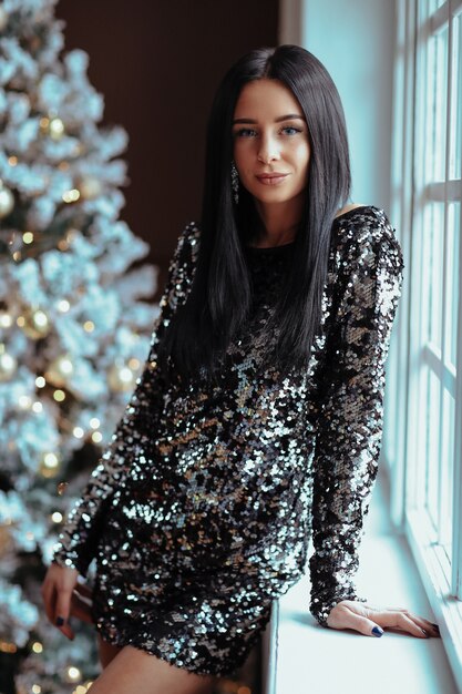 woman black sequin dress look