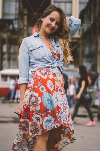 pretty woman posing on street