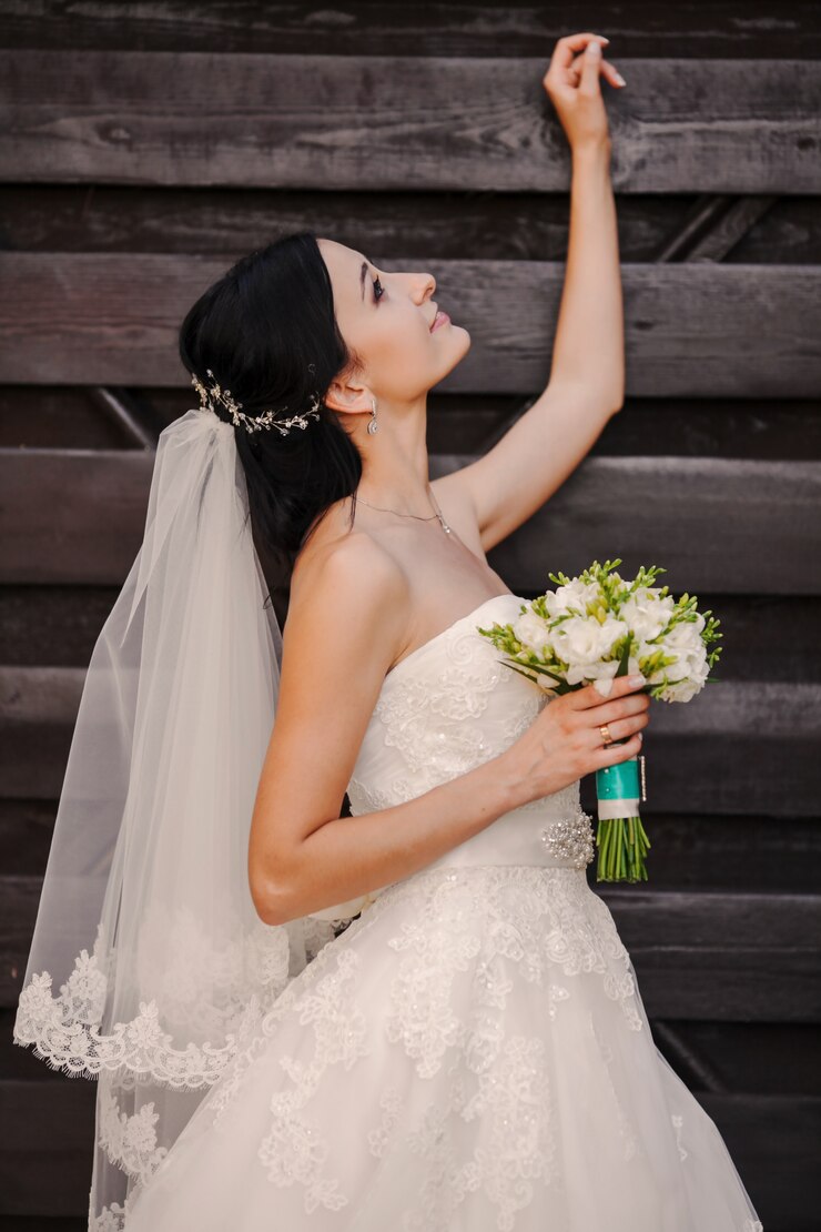 young bride look holding bouquet